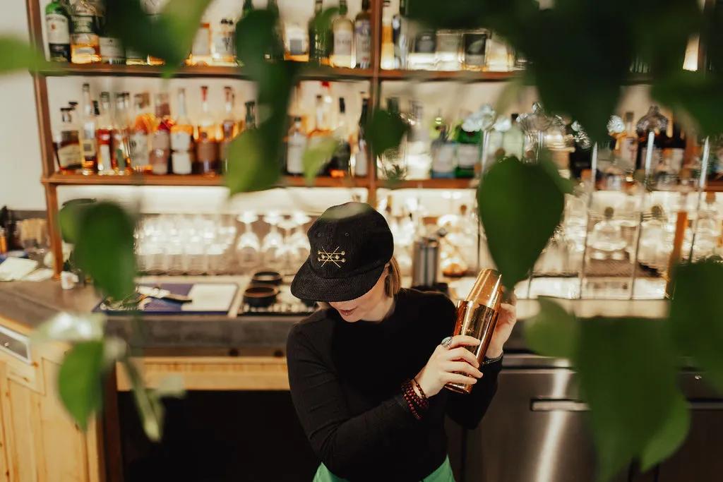 Story Idea submission of a Bartender making a drink at The Alchemists Garden