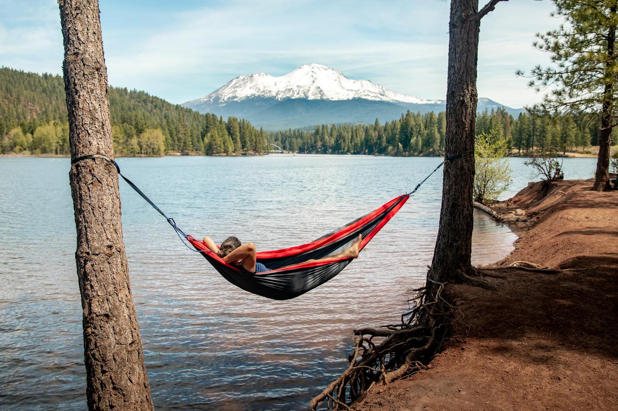 Hammocking at Siskiyou lake in Siskiyou county at midday.