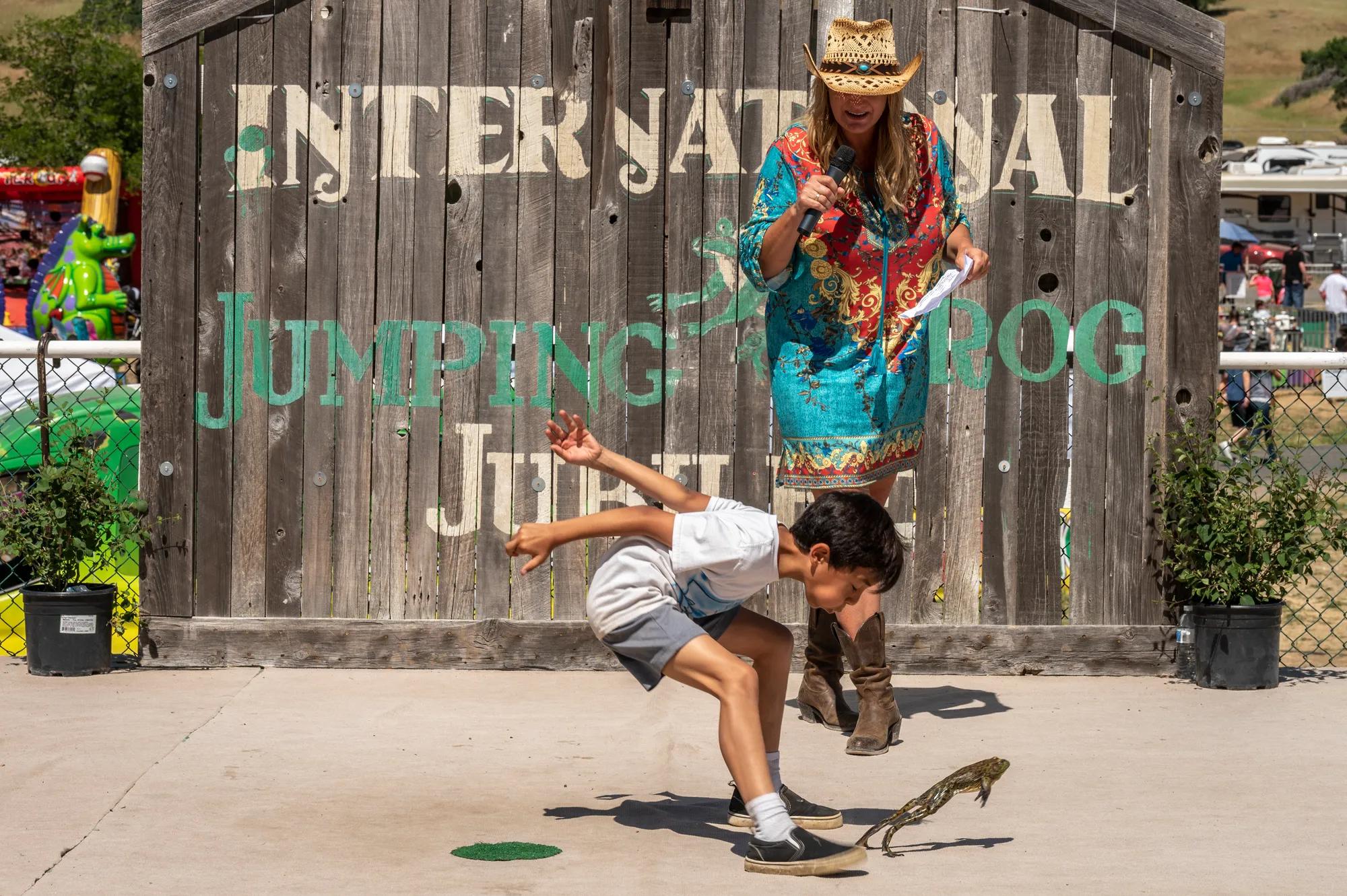 The Calaveras County Fair Jumping Frog Jubilee, held annually in Angels Camp, California, celebrates the region's rich gold rush history and the famous Mark Twain story, "The Celebrated Jumping Frog of Calaveras County." The event features the world-renowned frog jumping competition, where contestants race their frogs for prize money, along with live entertainment, carnival rides, and local exhibits. It's a beloved community tradition, attracting visitors from across the country to experience its unique blend of rural charm and quirky fun.