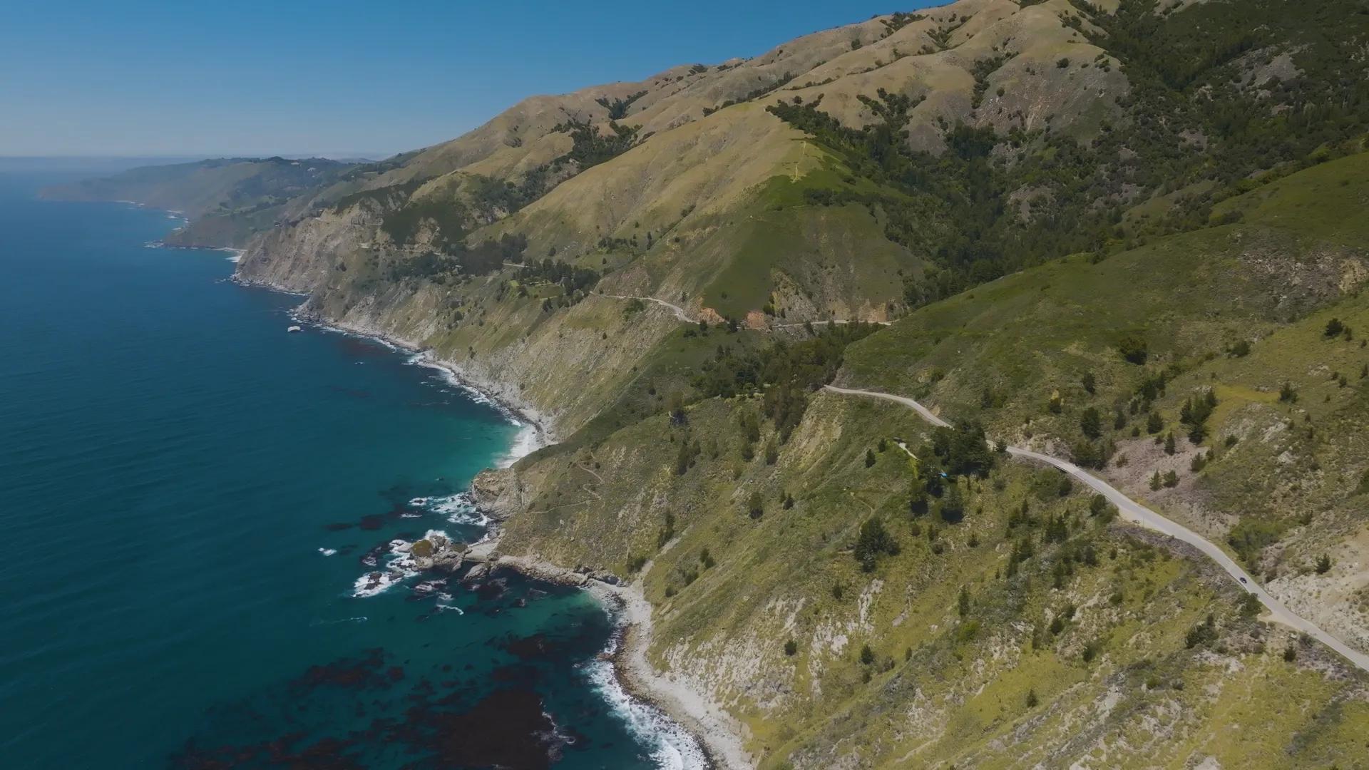 Aerial shot of Highway 1 along coast from the Highway 1 documentary by Louie Schwartzberg produced by Moving Arts