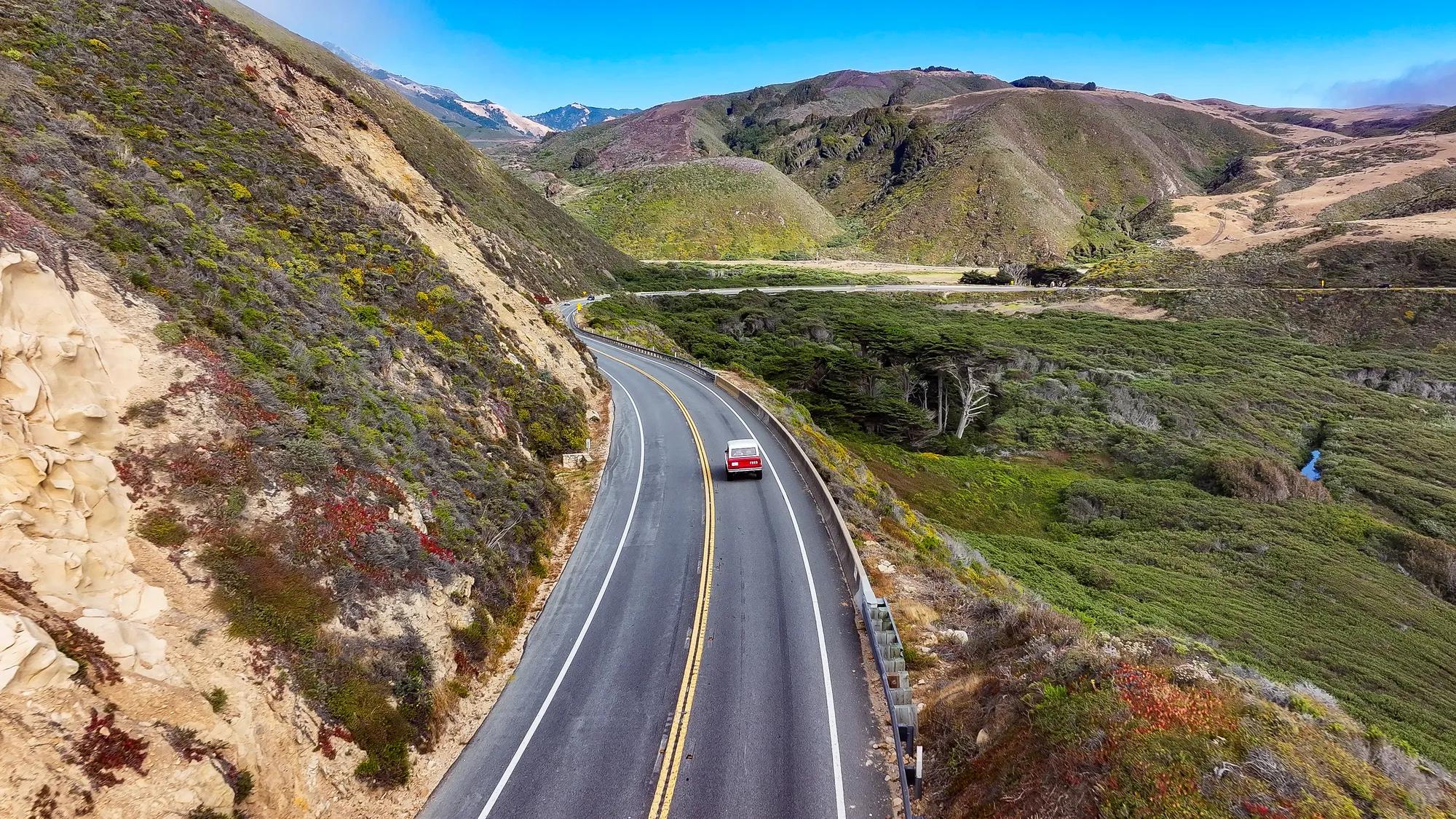 Highway1_RedCarDriving4_2025_MoreThanJustParks