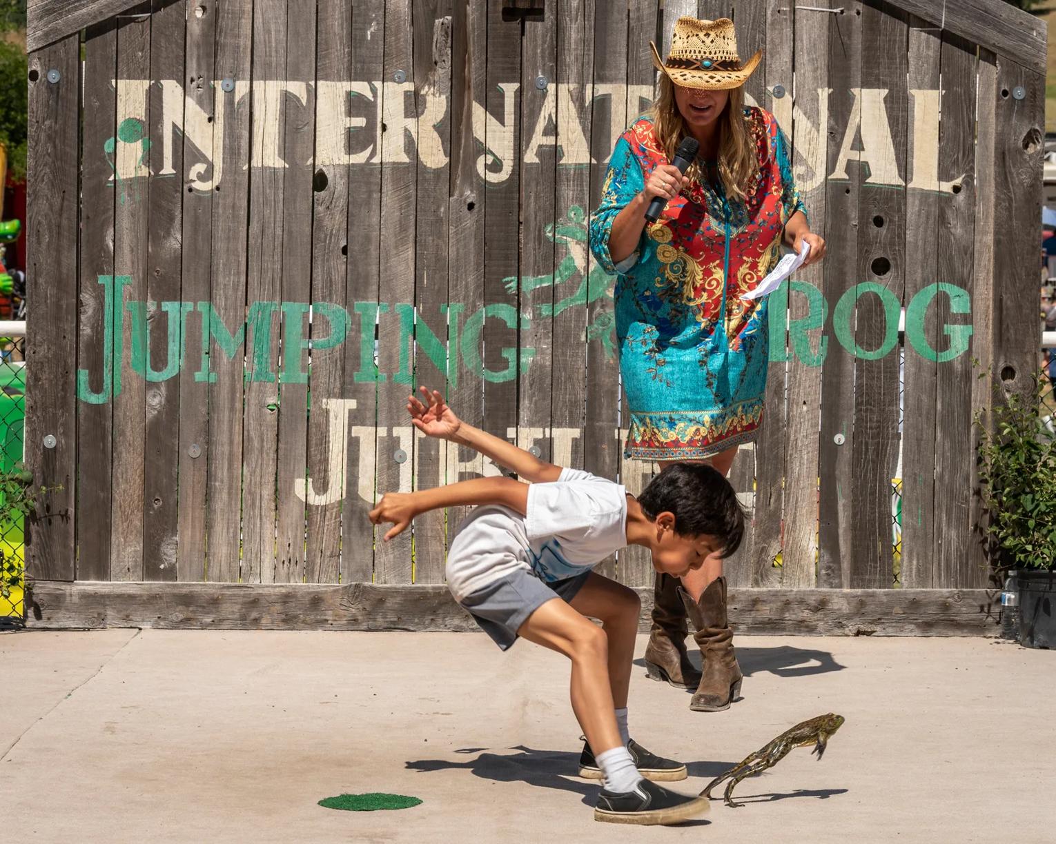 The Calaveras County Fair Jumping Frog Jubilee, held annually in Angels Camp, California, celebrates the region's rich gold rush history and the famous Mark Twain story, "The Celebrated Jumping Frog of Calaveras County." The event features the world-renowned frog jumping competition, where contestants race their frogs for prize money, along with live entertainment, carnival rides, and local exhibits. It's a beloved community tradition, attracting visitors from across the country to experience its unique blend of rural charm and quirky fun.