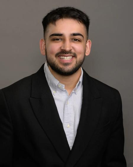 Headshot of San Sharma, Media Relations Coordinator at Visit California