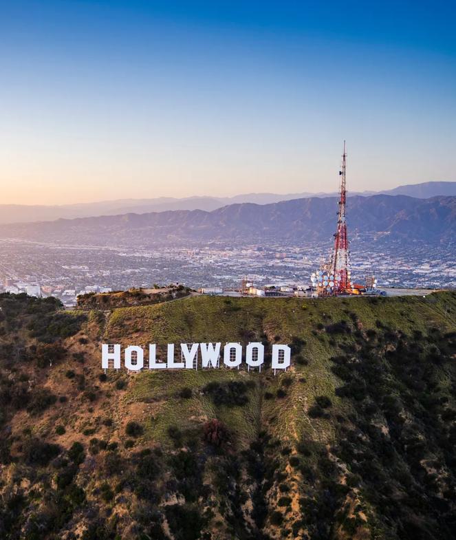 Aerial view of the iconic Hollywood Sign atop of the Los Angeles Hollywood hills overlooking the city.