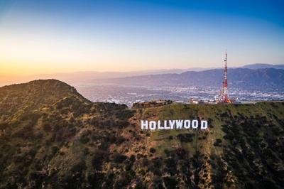 Aerial view of the iconic Hollywood Sign atop of the Los Angeles Hollywood hills overlooking the city.