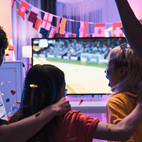 International soccer-football play and fans enjoying World Cup™ in various venues. 1435396428