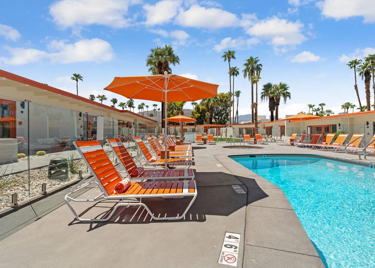 Whats New In California submission titled Reimagined Mojave Resort Debuts, featuring the resort's pool and outdoor lounge area, located in Palm Desert, CA.